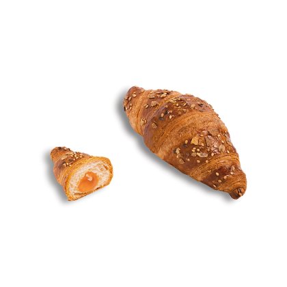 Celý croissant se semínky a ořechy vedle rozpůleného s oranžovou ovocnou náplní