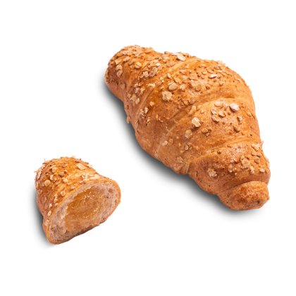 Celozrnný croissant s ovesnými vločkami vedle menšího kousku s meruňkovou náplní.
