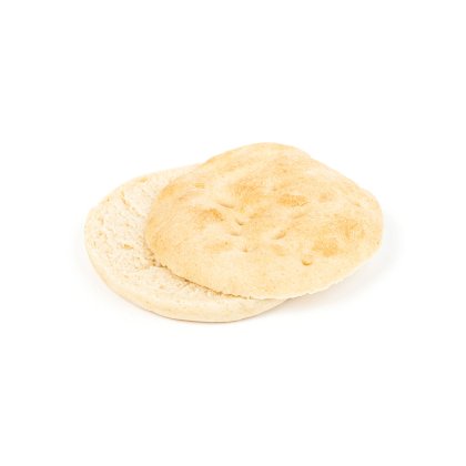 Dvě kulaté placky se zlatavým povrchem, mírně nakřivo naskládané na bílém pozadí.
