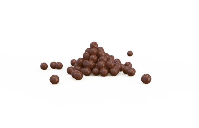 Pyramida z kulatých čokoládových kuliček s několika rozházenými kousky na bílém pozadí.